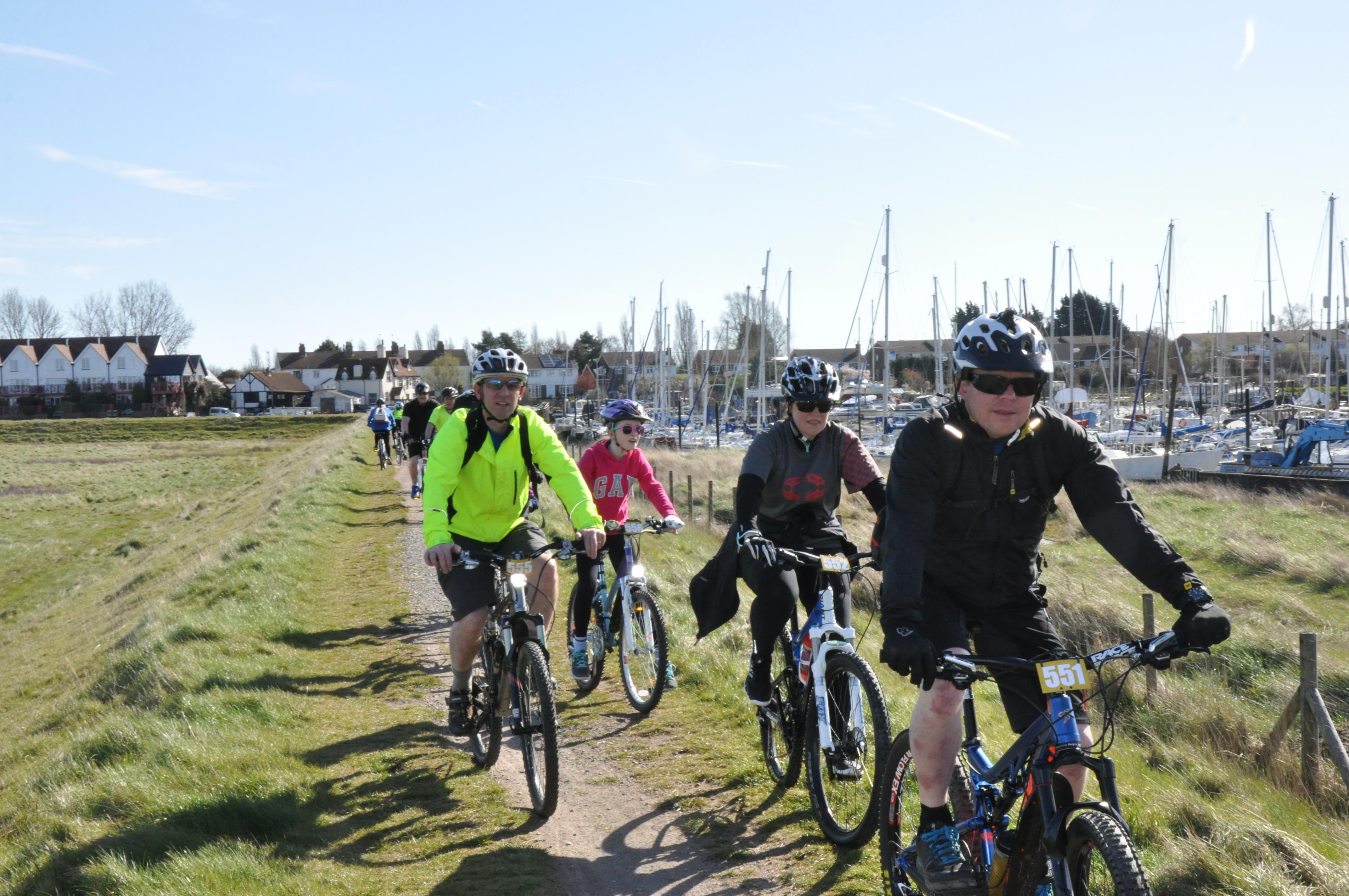 Cycling on river bank.JPG