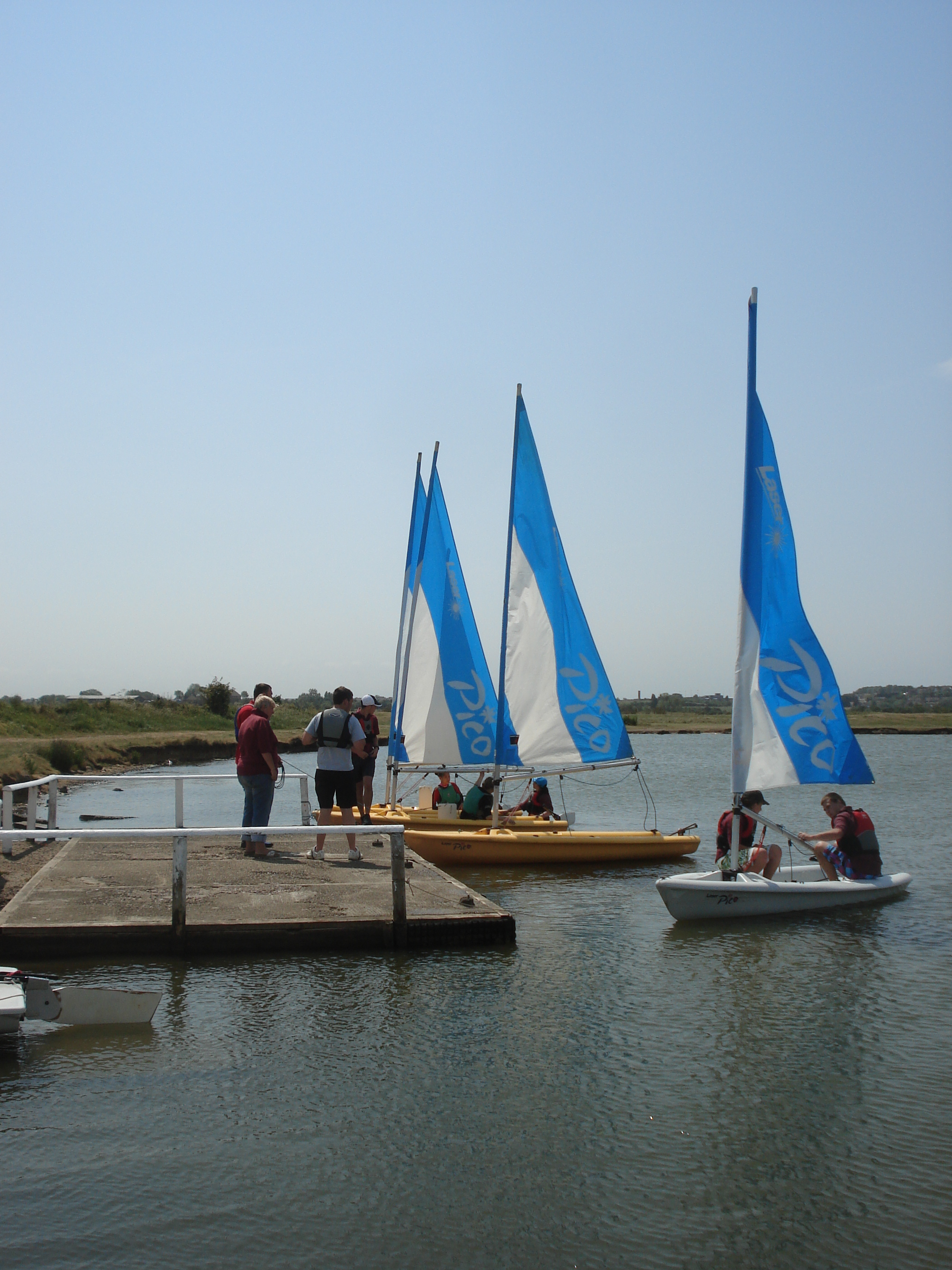 Sailing Boats Off Boathouse Cafe